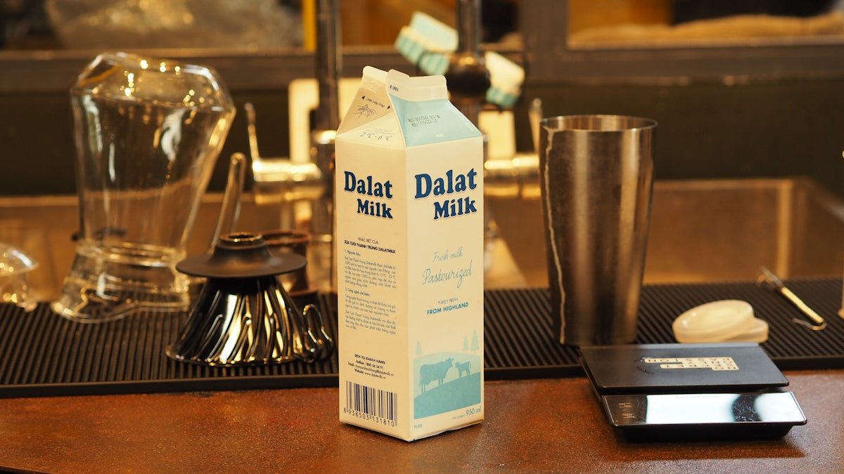 a carton of milk sitting on top of a table